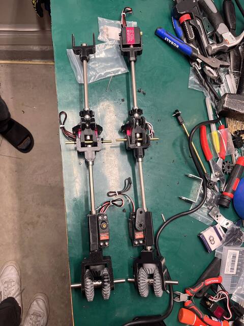 Paired arm assemblies